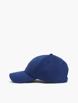 Gorra de béisbol azul marino de algodón con logo metálico dorado de Tommy Hilfiger en el frente.
