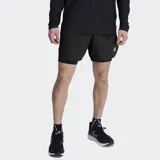 Short de running New Balance Q Speed 6 Inch 2-in-1, color negro, con calza interior de compresión. Presenta el logo NB en el muslo izquierdo.