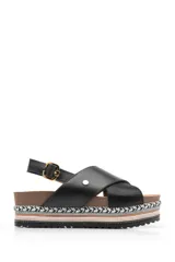 Sandalias negras de cuero con plataforma de yute y suela de goma.