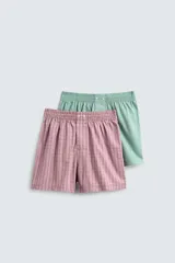 Pack de dos bóxers de algodón tipo boxer con cintura elástica. Uno es rosado con patrón de cuadros y el otro es verde menta con patrón de cuadros pequeños (vichy).