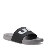 Chanclas tipo slide de la marca Umbro, con banda ancha negra y logo en relieve color blanco. Presenta una base de color gris con textura antideslizante.