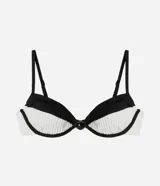 Top de bikini Bossa Nossa con diseño color block en negro y blanco, confeccionado en microfibra con textura plisada. Presenta copa estructurada con aro, breteles finos regulables y un detalle de botón decorativo en el centro.