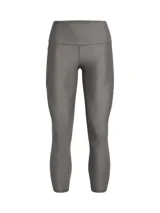 Calza deportiva Under Armour de color gris melange, con diseño ajustado de tiro alto, largo por encima del tobillo y bolsillos laterales. Incorpora la tecnología HeatGear para mayor comodidad y absorción del sudor.
