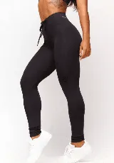 Calza negra de poliamida y elastano, con cintura alta y elástico interno.