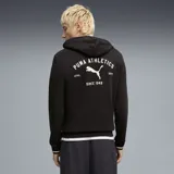 Canguro Puma de felpa color negro, con capucha con cordón ajustable, bolsillo frontal tipo canguro y detalles de líneas blancas en los puños. Presenta un pequeño estampado circular en el pecho con el logo de la marca y la inscripción "Puma Athletics".