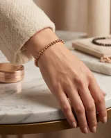 Pulsera de esferas pequeñas de plata 925 con baño en tono oro rosa.
