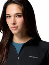 Campera deportiva Columbia de media cremallera color negro, con mangas largas y orificios para los pulgares en los puños, diseñada con tecnologías Omni-Shade y Omni-Wick.