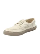Zapatillas de lona color beige, modelo Napa de RKF, con diseño tipo náutico, cordones frontales y suela de goma marrón.