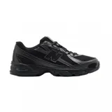 Championes New Balance modelo 740, color negro, con diseño técnico y deportivo de malla y refuerzos sintéticos, con la distintiva "N" en los laterales y tecnología ABZORB en la suela.