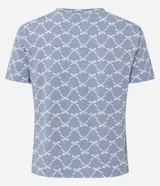 Blusa de pijama de viscosa con estampado de lacitos blancos sobre fondo azul. Presenta cuello redondo y mangas cortas, con un corte holgado y cómodo.