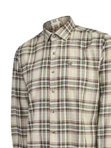 Camisa de manga larga RKF modelo Flannel, confeccionada en algodón orgánico. Presenta un diseño de cuadros en tonos beige, verde, marrón y naranja, con cierre frontal de botones, cuello camisero y un bolsillo aplicado en el pecho con detalle bordado.