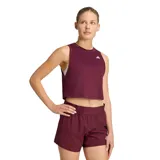 Top deportivo Adidas color bordó, de corte crop y diseño sin mangas con cuello redondo.
