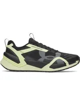 Championes de entrenamiento Under Armour Reign XT para hombre, color negro con detalles en verde lima y gris. Presentan tecnología UA HOVR en la suela y estructura de TPU.