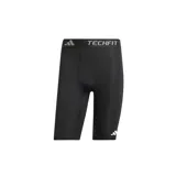 Calza corta de compresión Adidas Techfit negra con logo blanco en la pierna izquierda y cintura elástica con la inscripción Techfit en gris.