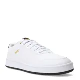 Championes urbanos Puma Court Classic, color blanco con detalles en negro y dorado. Presentan logo de Puma dorado en el lateral y suela blanca con base negra.