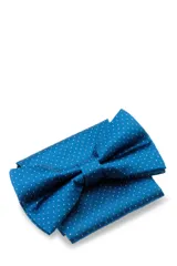 Moña amarilla con estampado floral y pañuelo de bolsillo a juego, presentados en caja negra.