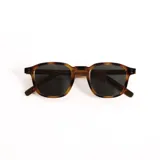 Lentes de sol con armazón de acetato en tono carey y cristales oscuros con protección UV400.