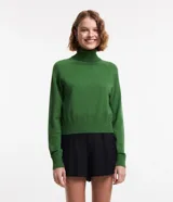 Blusa de punto de la marca Blue Steel, con cuello alto, manga larga y diseño básico ajustado al cuerpo.