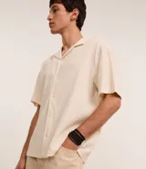 Kit de seis pulseras masculinas de color negro con distintos diseños, incluyendo modelos trenzados con cierre ajustable y modelos de cuentas de madera y vidrio.