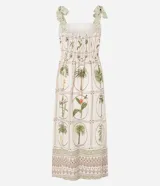 Vestido midi de corte evasé confeccionado en viscolino (mezcla de viscosa y lino). Presenta un diseño con estampado de palmeras y follaje sobre un fondo beige. Cuenta con escote cuadrado, breteles anchos con lazos ajustables en los hombros y espalda con lastex para un ajuste cómodo.