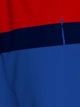 Short de baño Tommy Hilfiger con diseño color block en blanco, rojo y azul. Cintura elástica con cordón ajustable y logo de la marca bordado en la pierna. Fabricado en nylon reciclado de secado rápido.