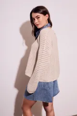 Sweater celeste de tejido de punto calado con lurex, de corte holgado y mangas largas.