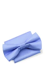 Moña amarilla con estampado floral y pañuelo de bolsillo a juego, presentados en caja negra.