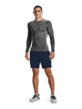 Remera térmica de compresión Under Armour de manga larga, confeccionada en tejido HeatGear ultraligero con paneles de malla estratégicos para ventilación. Presenta diseño ergonómico con mangas raglán y logo de la marca en el pecho.