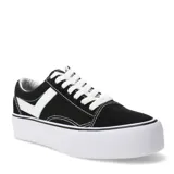 Championes de estilo urbano marca Pony, modelo Old School con plataforma. Presentan un diseño en color negro con detalles en blanco, incluyendo la característica franja lateral de la marca, cordones blancos y suela de goma blanca con textura en la puntera.