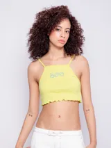 Top blanco sin mangas con breteles finos, escote cuadrado y bordado de tres caritas sonrientes en el frente.