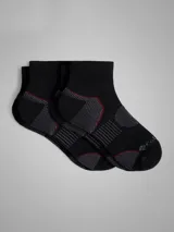 Pack de dos pares de medias deportivas tobilleras de color negro con paneles grises y detalles en rojo, de la marca Columbia.