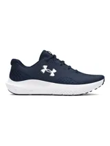 Championes de running Under Armour modelo Charged Surge 4, color azul marino con entresuela blanca. Presentan parte superior de malla transpirable con superposiciones sintéticas, amortiguación Charged Cushioning y suela de goma resistente.