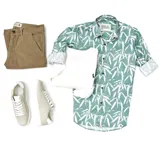 Camisa de manga larga verde con estampado de hojas blancas, cuello clásico y cierre con botones.