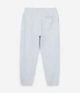 Pantalón jogger de corte holgado con cintura elástica, cordón ajustable, bolsillos laterales y puños elásticos en los tobillos.