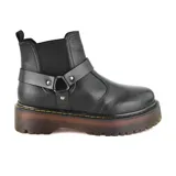 Bota de cuero negra con elástico lateral, correa con hebilla y plataforma con suela track.