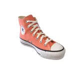 Championes Converse Chuck Taylor All Star Lift color naranja, de caña alta y plataforma blanca.