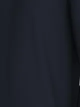 Remera de manga larga Tommy Hilfiger color azul marino, de corte slim y cuello redondo. Presenta el logo de la marca bordado en el pecho.