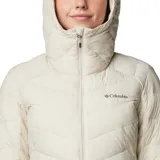Campera acolchada de largo medio con tecnología termorreflectante, aislamiento sintético reciclado y acabado resistente a la humedad. Cuenta con capucha, cierre frontal completo, bolsillos laterales con cremallera y puños con orificios para pulgares.