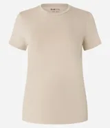 Blusa básica de manga corta y cuello redondo, confeccionada en algodón con spandex, de color salmón y diseño liso.