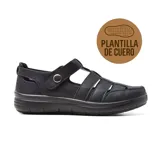 Zapato casual Korium Confort Estefan de cuero sintético negro, con plantilla de cuero, ajuste con velcro y suela de goma.