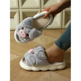 Pantuflas de peluche gris con diseño de chanchito, con suela de goma blanca y modelo abierto sin talón.