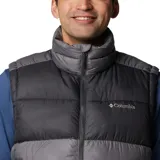 Chaleco acolchado Columbia modelo Pike Lake II, con diseño bicolor en tonos gris oscuro y gris claro. Cuenta con cierre frontal completo, cuello alto, bolsillos laterales con cremallera y tecnología termorreflectante Omni-Heat en el interior.