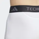 Short de compresión deportivo Adidas Techfit, color blanco con logo negro en la pierna izquierda y cintura elástica negra con la inscripción "Techfit" en blanco.