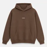 Canguro con capucha de calce oversize, confeccionado en tejido pesado color gris claro. Presenta un bordado minimalista con la palabra 'ASCEND' en la parte superior trasera, puños y ruedo acanalados.