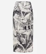 Pollera midi de viscosa y lino color crudo, con estampado de paisajes modernistas, nudo lateral y corte al bies.