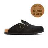 Zueco negro de cuero con hebilla metálica ajustable y plantilla anatómica de corcho.
