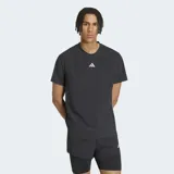 Remera deportiva Adidas de running color negro, con cuello redondo, manga corta y paneles perforados para mayor ventilación.