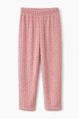 Pantalon de pijama de tela plush suave, con estampado de estrellas rosadas sobre fondo gris. Cuenta con cintura elastizada para mayor comodidad.