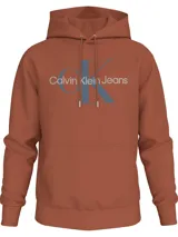 Buzo con capucha color ladrillo, con cordones ajustables, puños y bajo acanalados, bolsillo tipo canguro y logo Calvin Klein Jeans estampado en el pecho.