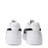 Championes de plataforma Puma modelo Karmen Classic, de color blanco con la franja lateral característica en negro y detalles dorados de la marca. Poseen suela chunky de goma y capellada sintética.